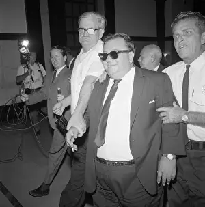 60 64 Years Prints: Suspect Dean Andrews Being Escorted by Police