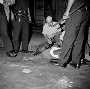Looting Prints: Suspected Looter Shot & Lying On Ground