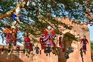 Images Dated 17th November 2015: Suspend dolls from tree at Dhamma Yan Gyi Temple, Bagan, unesco ruins Myanmar. Asia