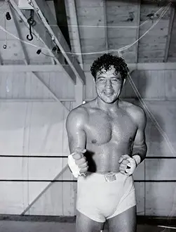 Sweating Prints: Sweaty Max Baer Poses in Fighting Stance
