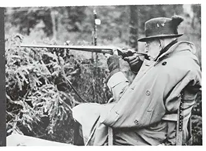 Sweden's King Gustaf Pointing Rifle