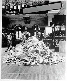 Worker Prints: Sweeping up at End of Day at NY Stock Exchange
