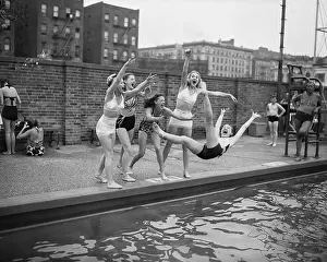Swimmers Playing in Pool