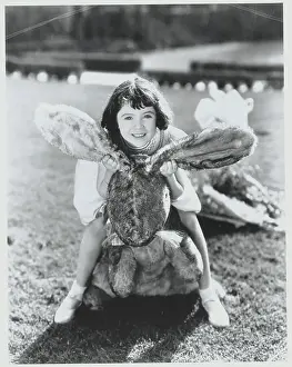 Sybil Jason Playing with Toy Rabbit