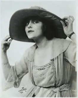 Sylvia Breamer Adjusting Her Hat