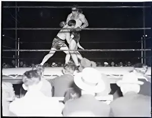 Punching Prints: T. Loughran Misses P. Carnera W/Punch
