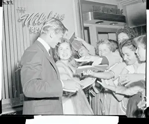 Autographing Prints: Tab Hunter and Debbie Reynolds at Premiere