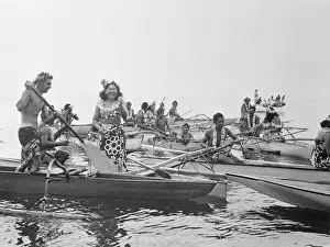 Tahitians in Outrigger Canoes