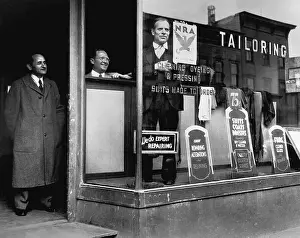 Tailor Jacob Meged Standing in Store Window