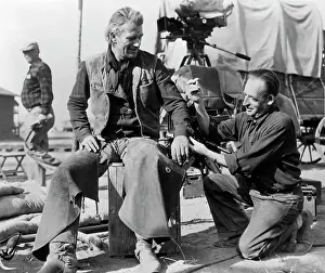 Chaps Prints: Tailor on Set Mending John Wayne's Shirt