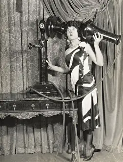 Talking on Oversized Telephone
