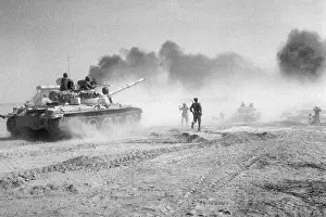 Tank Advances Through Smoke