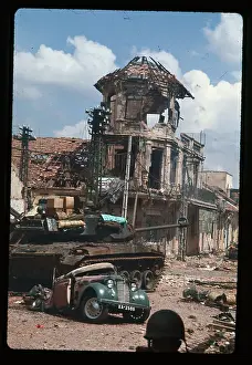 Tank Demolishing a Car