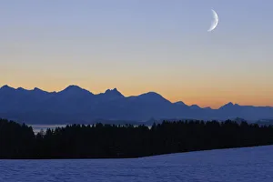 Crescent Gallery: Tannheimer Berge mountains with Lake Forggensee near Fuessen, Allgaeu, Bavaria, Germany, Europe