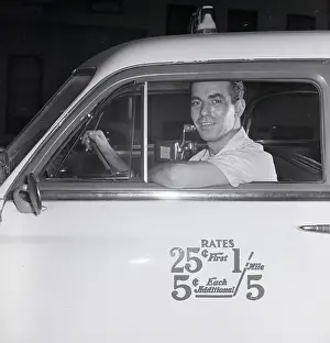 Taxi Prints: Taxi Driver Sitting In Cab