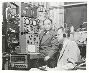 T.C. Wang and J.P. Gordon with Clock Readers