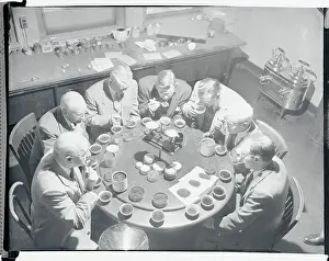 Tea Testers Trying Tea Assortments at Round Table