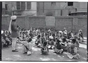 Class Prints: Teacher Instructing Class Outdoors