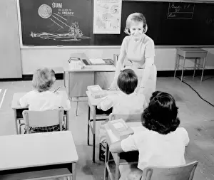 10 11 Years Prints: Teacher and pupils (8-11) during lesson
