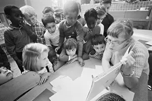 Ethnic Diversity Prints: Teacher Reads to Students in Integrated Classroom