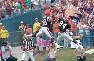 Teammates Giving High-Five on Field
