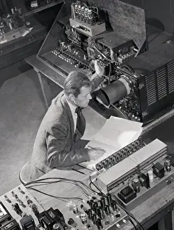 Technical Director Demonstrating EDVAC Computer Components