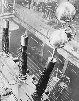 Technician Adjusting Polished Aluminum Spheres