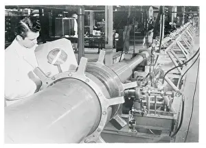 Everett Prints: Technician Placing a Steel Diaphragm on a Shock Tube