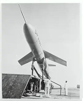 Technicians Checking a Missile