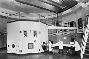 Technician Prints: Technicians Replacing a Reactor's Shield Plug