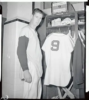 Ted Williams Hanging His Uniform in Locker Room