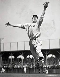 Ted Williams Prints: Ted Williams Jumping to Catch Baseball