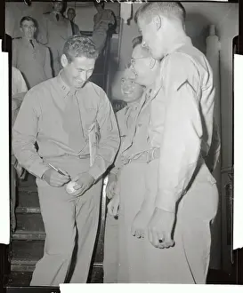 Ted Williams Signing Baseball for Fans
