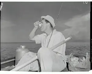 Ted Williams Taking a Drink While fishing