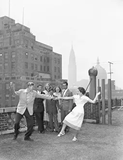 Orphan Prints: Teen Couple Dancing As Others Look On
