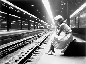 Teenage Girl Waiting for Train