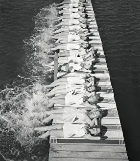 Photographic Study Prints: Teenage Girls Lying on Edge of Beach