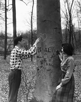 Boyfriend Prints: Teenagers Carving Initials on a Tree
