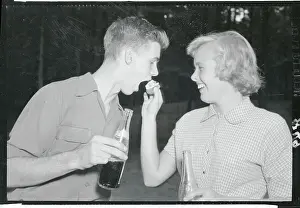 Eleanor Grisell Prints: Teenagers Sharing a Hot Dog