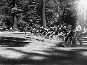 Rolling Prints: Teens Rolling Log at Work Camp