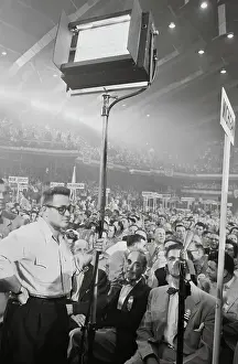 Television Technician Holding Teleprompter