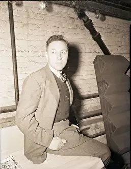 Backstage Prints: Tennessee Williams Sitting on Table