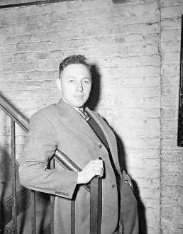 Backstage Prints: Tennessee Williams Standing by Handrail