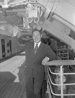 Tennessee Williams Standing Near Ship Staircase