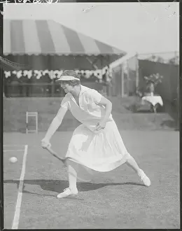 Tennis Champion Helen Wills in Action
