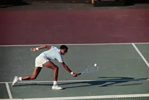 Tennis Court Prints: Tennis Player Arthur Ashe Lunging for the Ball
