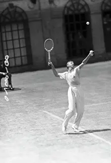 Tennis Court Prints: Tennis Player Don Budge Serving Tennis Ball