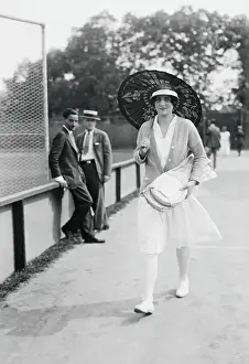 Tennis Player Helen Wills Strolling with Umbrella