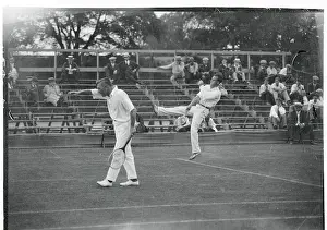 Tennis Players Competing in a Match