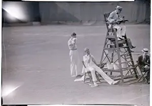 Tennis Players Resting Between Sets